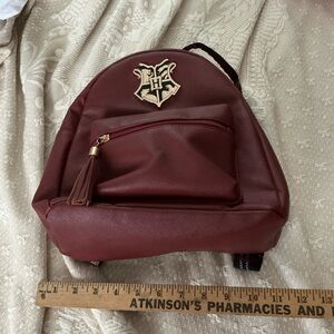 HARRY POTTER HOGWARTS, Burgundy Mini Backpack with Gold Crest Accent